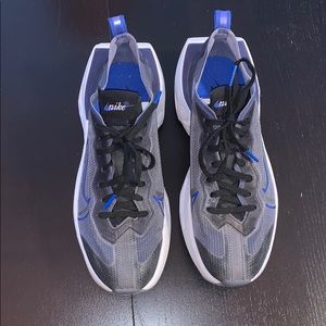 Nike Zoom Black with blue accents and white sole.